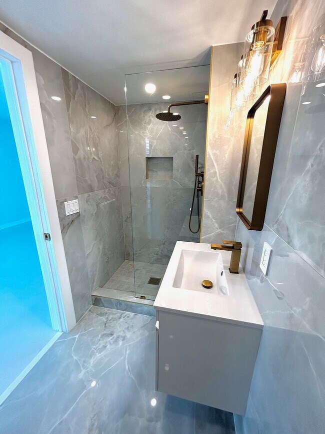 Building Photo - Fully Renovated East-Facing 2BR/2BA + Bonus Room | Ocean Views | In-Unit W/D