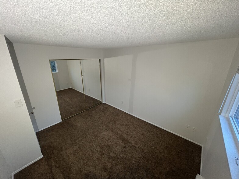 Second bedroom, view towards closet doors - 6470 SW 192nd Ave