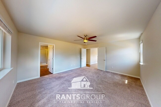 Building Photo - Luxury 4-Bedroom Home with 5-Car Garage & ...