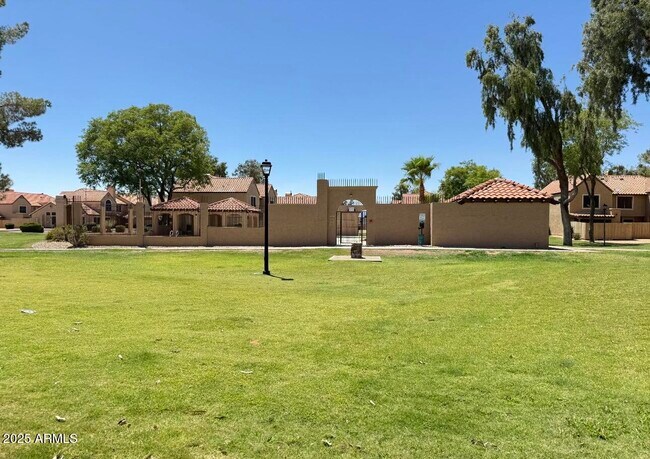 Building Photo - 4601 N 102nd Ave