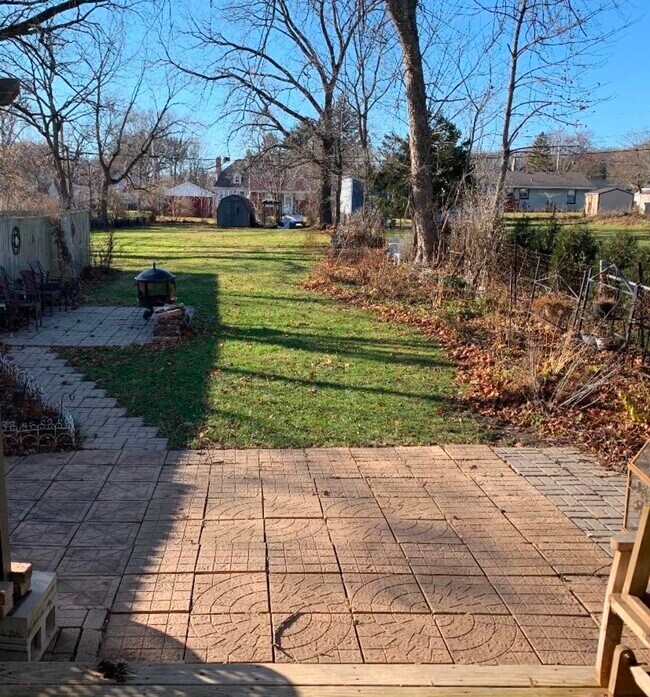 Fenced in large backyard with deck and 2 patio areas - 1212 Williams St