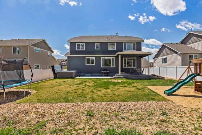 Building Photo - Spacious 4-Bedroom Home with Private Backy...