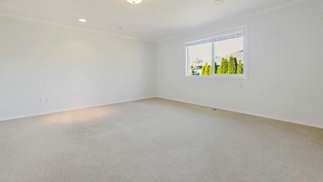 Building Photo - Spacious Updated 4 Bedroom Home with 3 Car Garage