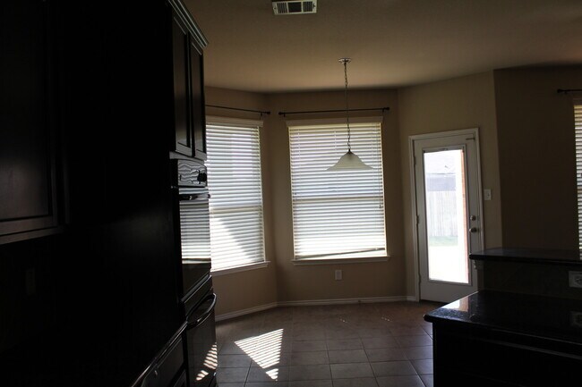 Building Photo - Over 3000 square feet with 3 car garage!