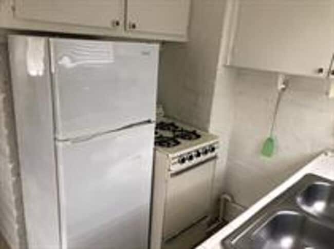 Building Photo - 7153 Elm Ave