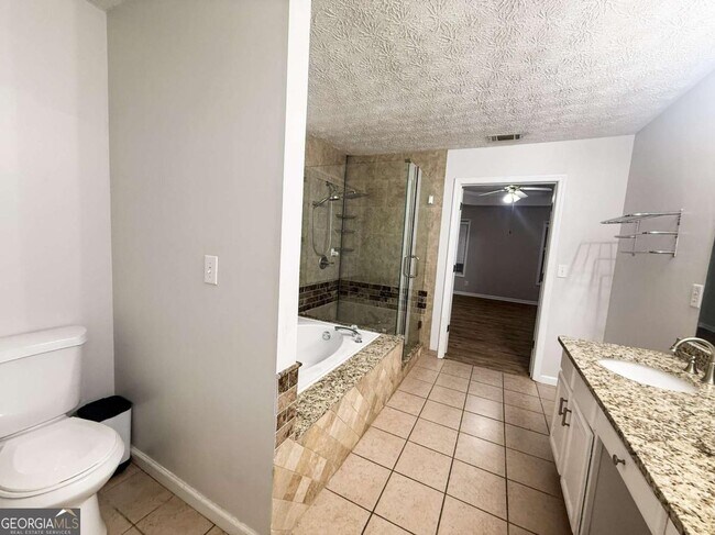 Building Photo - 5555 Grove Place Crossing SW