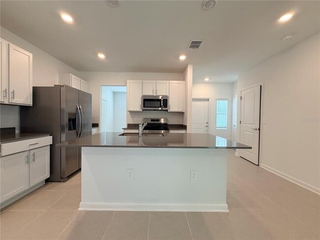 Building Photo - 7420 OLIVEWOOD Ave