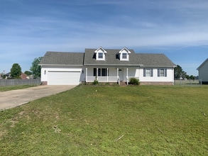 Building Photo - Available July! Just Minutes from USGC Base!