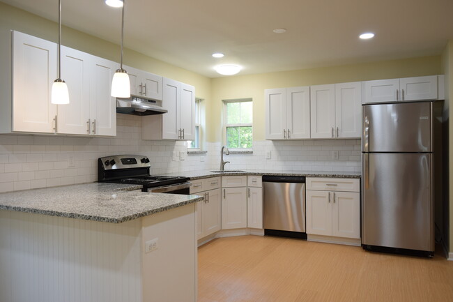 Kitchen newly remodeled granite counter tops and stainless appliances. - 381 Ferry Ave