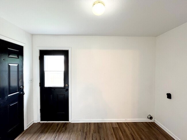 Building Photo - Available Now!!!! Gorgeous 3 bedroom, 2 bath, 2 car garage home. Beautiful wood look flooring. Sp...