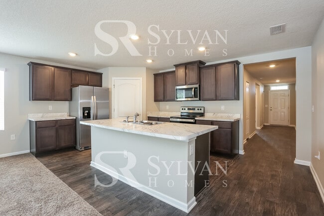 Building Photo - Turn the key. Enter. Smile. Repeat every day!