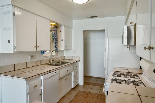 Building Photo - 3BR + Office Home in Excellent Condition with Storage Sheds and Garage Workspace!