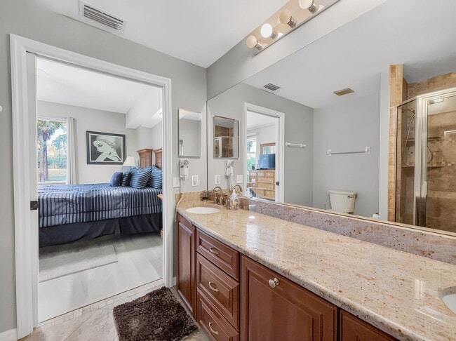 Building Photo - Beautifully furnished 2BR/2BA first-floor condo