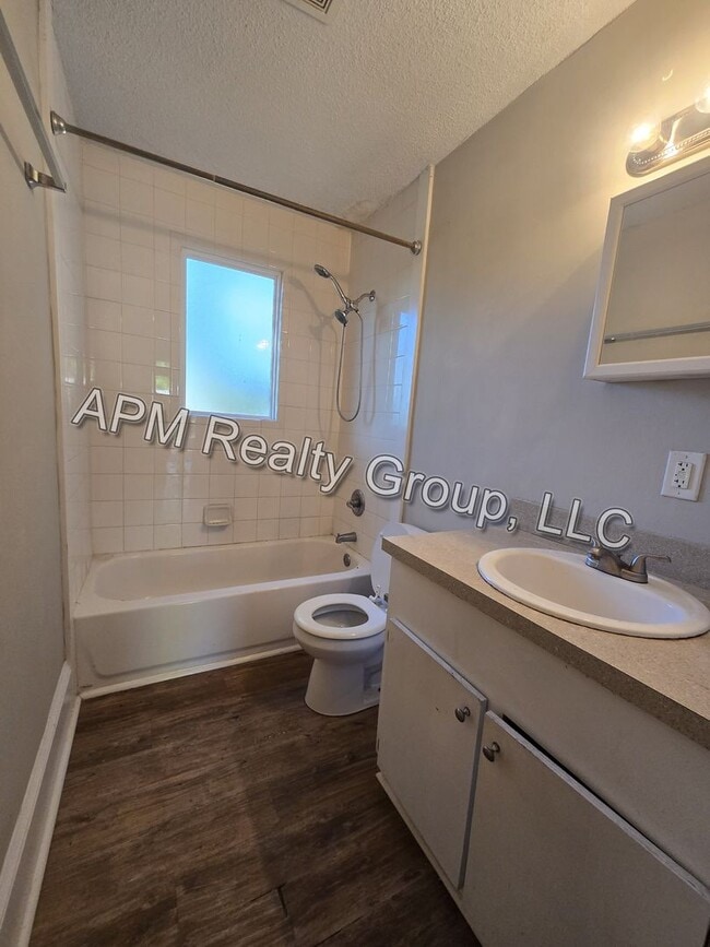 Building Photo - Four-bedroom house off North Main