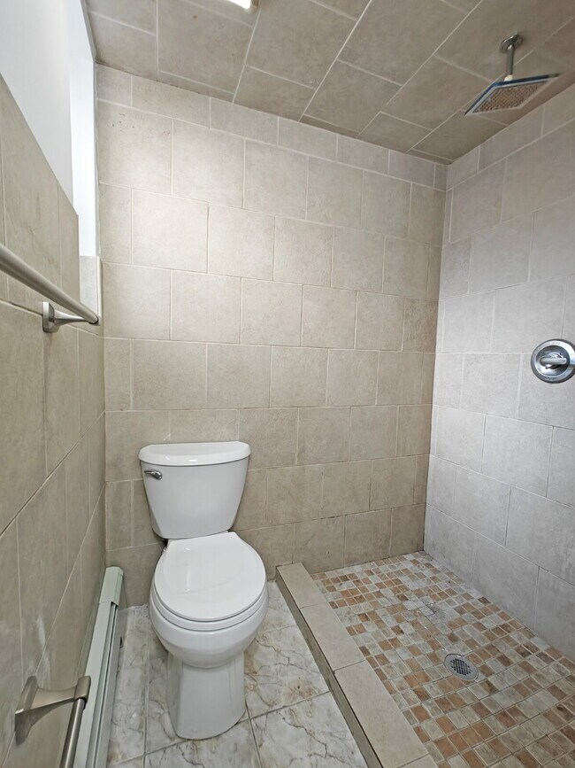Building Photo - Spacious Fully Renovated Corner-Home Available Now!