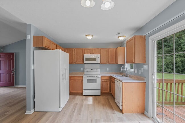 Building Photo - "Charming 3-Bedroom Sanctuary with 2 Full ...