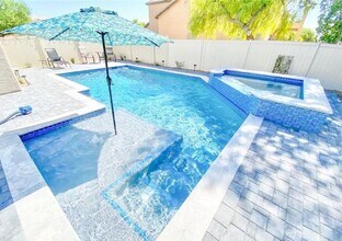 Building Photo - ENJOY THIS STUNNING 3 BEDROOM WITH A TRANQ...
