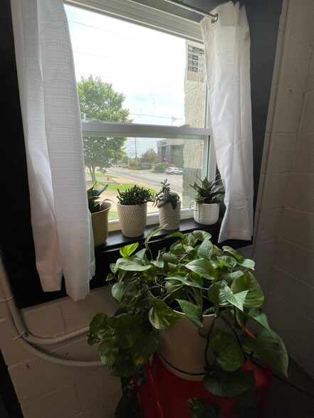 Window of laundry mat. - 475 S Hickory St