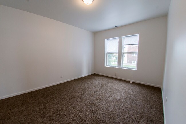 Building Photo - 1101-1105 N Lawler Ave