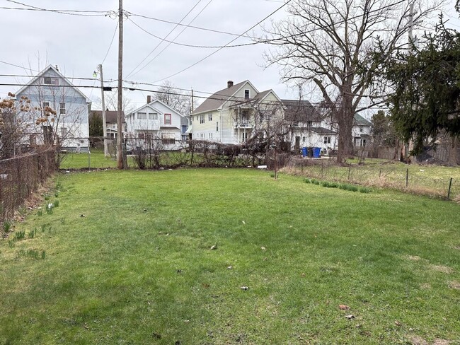 Building Photo - Three bedroom one bathroom 2 story home for rent