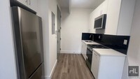 Building Photo - FRESHLY GUT RENOVATED LARGE 1 BEDROOM ROGE...