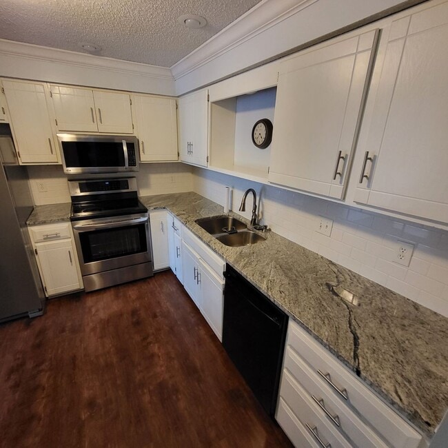 Building Photo - Spacious 3-Bedroom Twin Home in Prime Eden...
