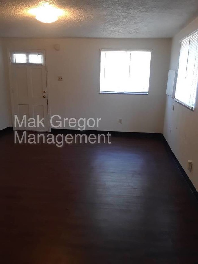 Building Photo - New Flooring, Fresh Paint, Appliances, A/C.