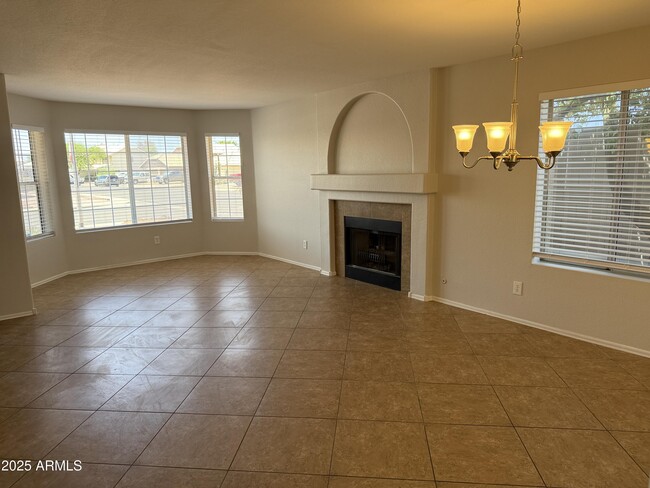 Building Photo - 8460 W Aster Dr