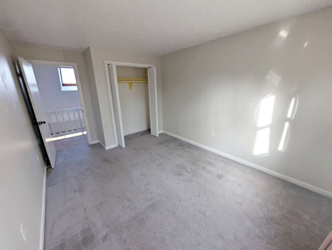 Building Photo - Stunning 2BR Townhome with Private Deck