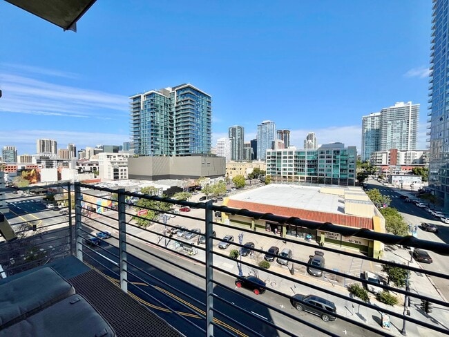 Building Photo - Stunning Corner Loft in East Village with Floor-to-Ceiling Windows & City Views!