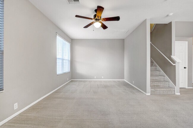 Building Photo - Stylish Two-Story Townhome with Greenbelt ...
