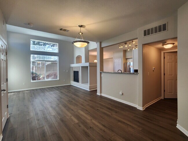 Building Photo - Spacious Two-Suite Townhome With Garage, Fireplace And Community Pool