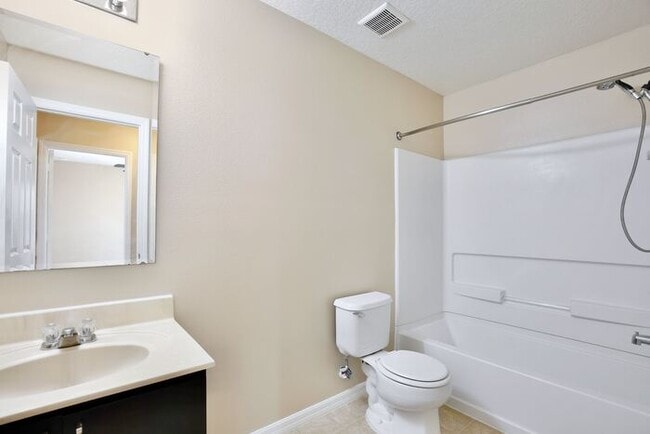 Building Photo - Spacious 3/2.5 End-Unit with Breathtaking Lake Views in Sanford!