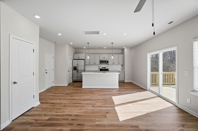 Building Photo - 4BR Home in The Pines at Paw Creek – New Construction + Private Deck