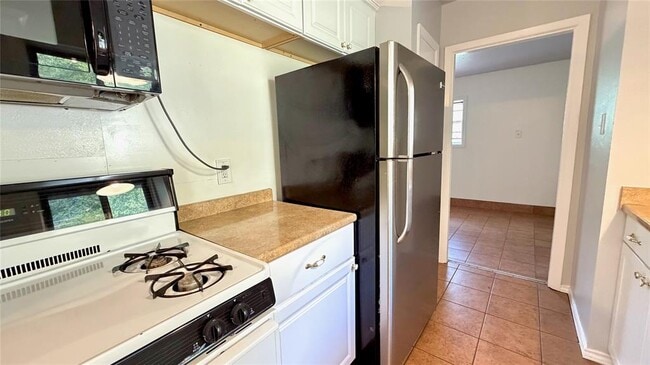 Building Photo - 5213 Halmark Dr