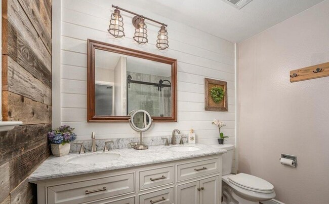 Building Photo - A Private Oasis with Unmatched Amenities 4 Bedroom 3 Bath
