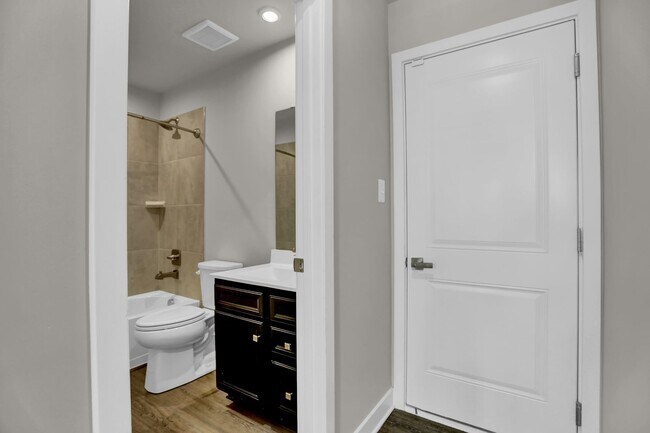 Building Photo - Luxury 4-Story Townhome with Rooftop Terrace!