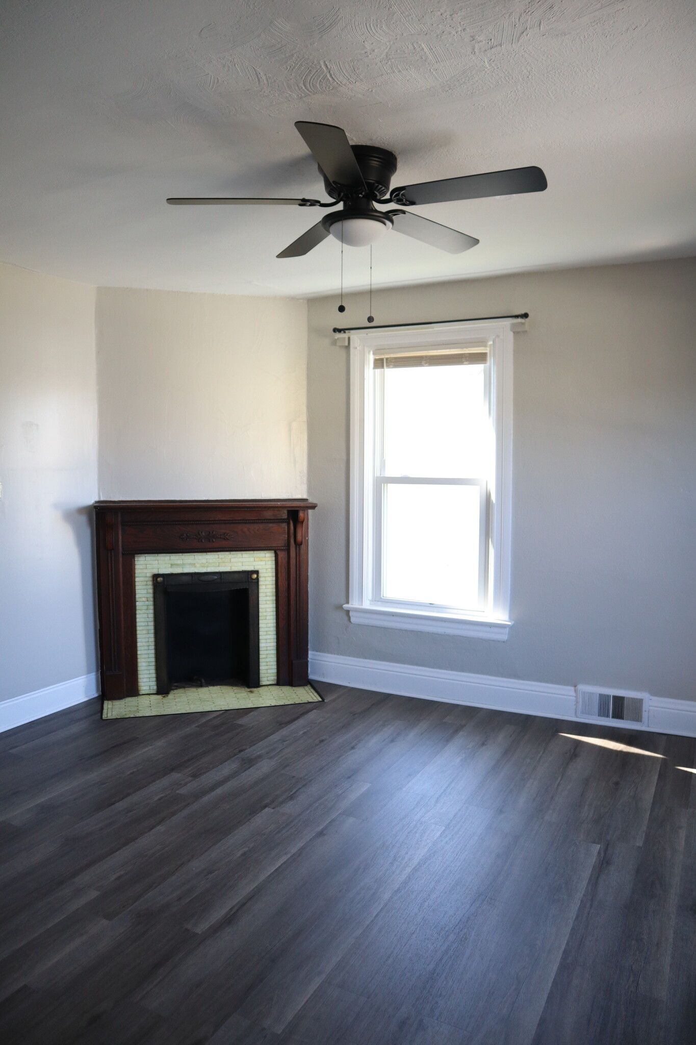 Bedroom #2 has a cosmetic fireplace and mantle - 715 Clinton Pl