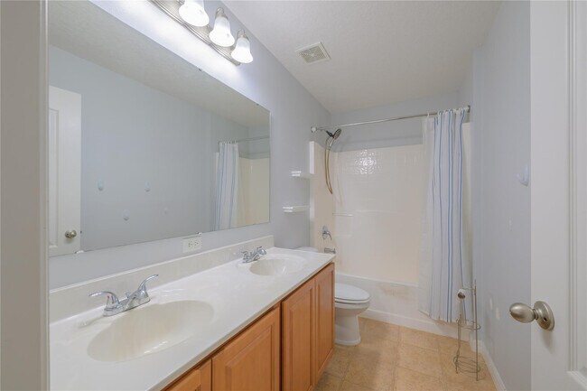 Building Photo - 6147 NW Butterfly Orchid Pl