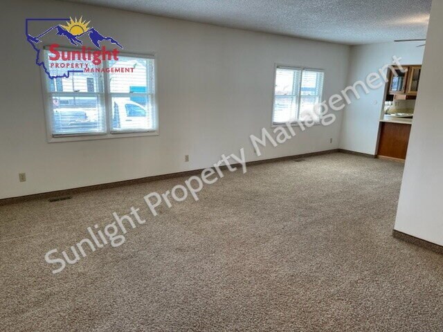 Building Photo - "Charming 2-Bed, 2-Bath Retreat in Laurel, MT – Your Perfect 1148 Sq Ft Haven on 5th Ave Awaits!"