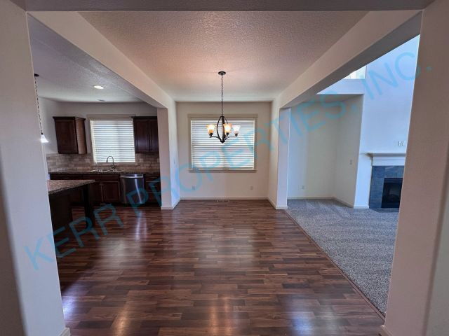 Building Photo - Spacious 5-Bedroom Retreat with 3407 Sq Ft...