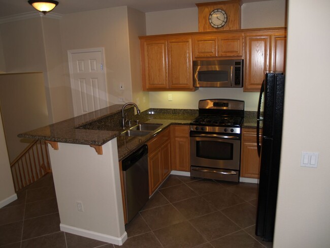 Building Photo - Private Street Entrance! Attached Garage! ...