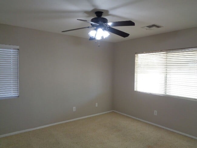 Building Photo - Cozy 3 bedroom home in Goodyear! Large bac...