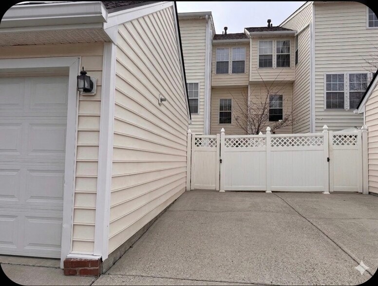 Unit comes with a parking space and access to the garage for larger item storage. - 7837 Heaton Way