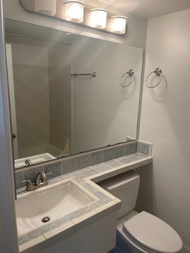 Building Photo - Cute and Cozy East Queen Anne Condo with 2 Bedrooms, 1 Bath and 1 Covered Parking Space