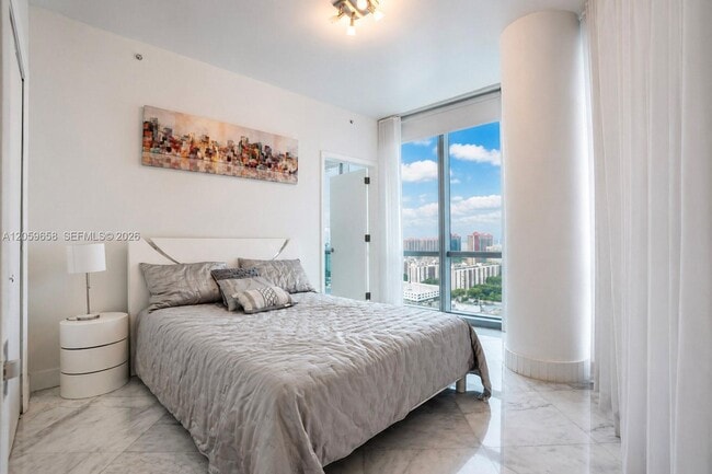 Building Photo - 17121 Collins Ave
