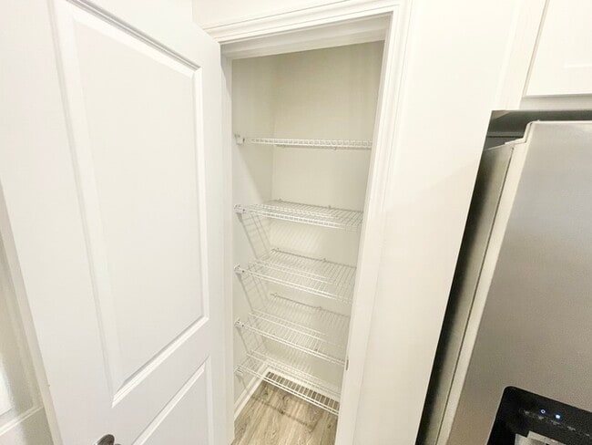 Building Photo - Three bedroom 2 1/2 bath paired home. Clos...
