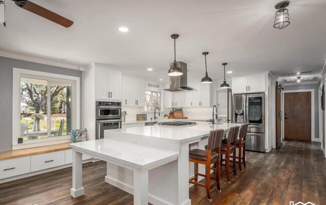 Building Photo - A Private Oasis with Unmatched Amenities 4 Bedroom 3 Bath