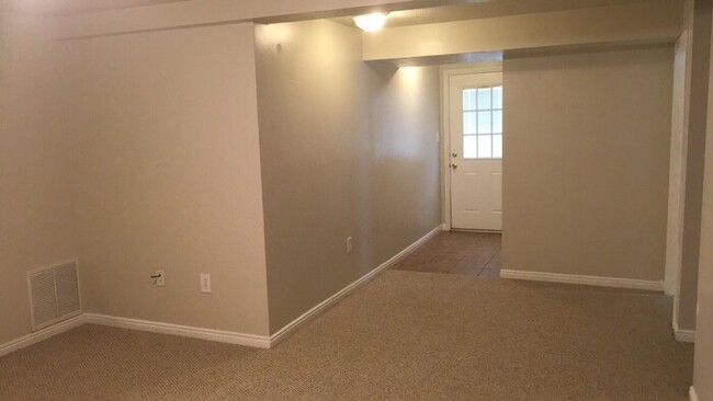 Building Photo - Spacious & Open Basement Apartment