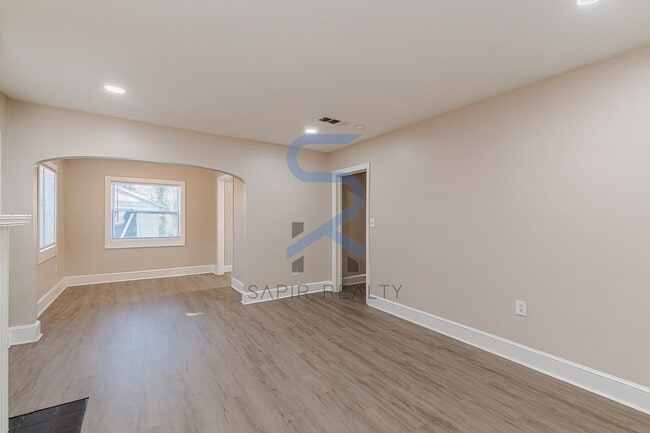 Building Photo - Move in before December 15th and choose your reward: a $250 Amazon Gift Card or a 55" Smart TV!